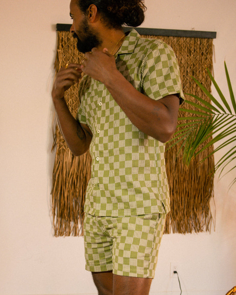 man in matching green cabana set