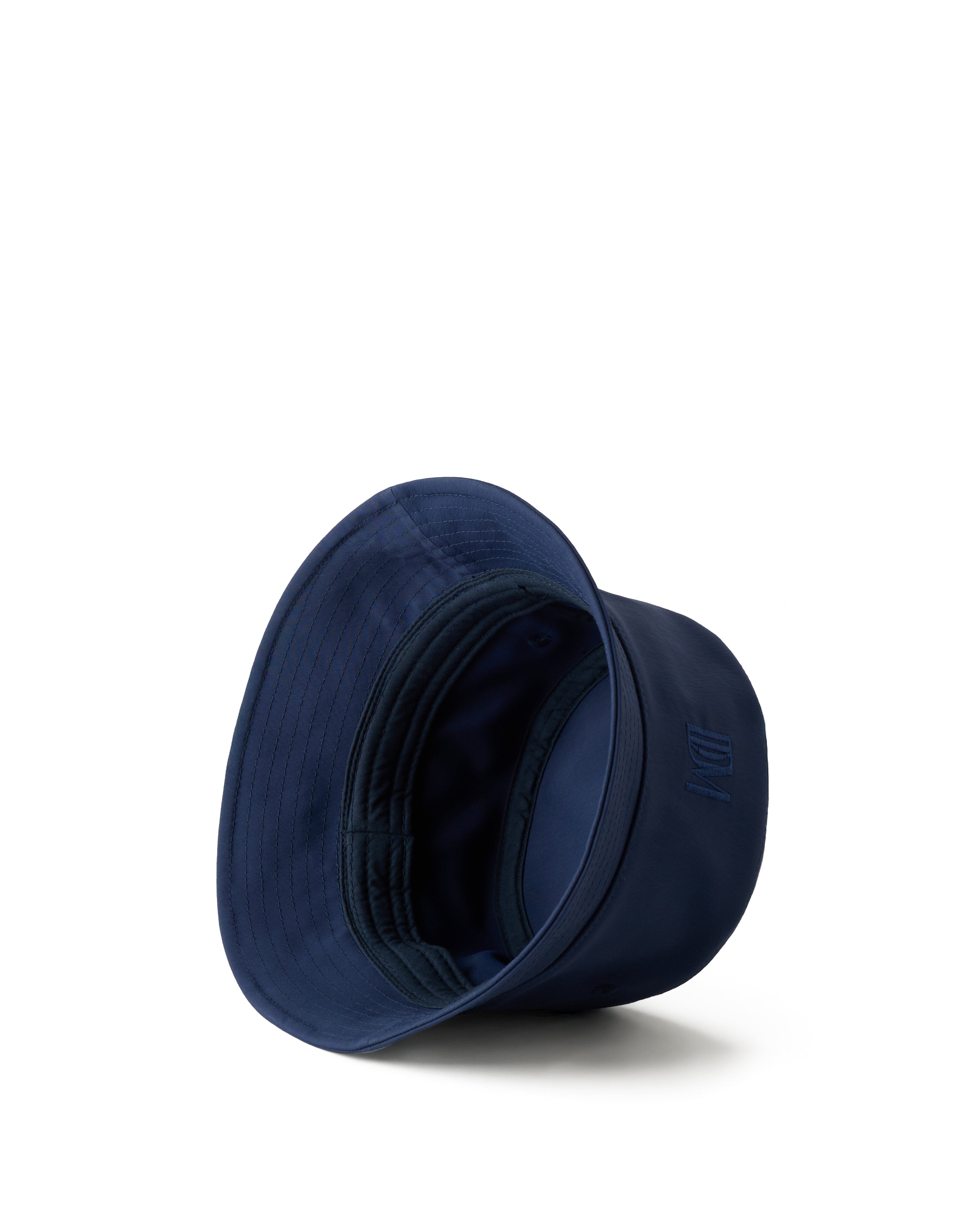 The Dandy Del Mar "The Bucket Hat - Anchor" is shown upside down, highlighting the interior stitching and sweatband, set against a white background.