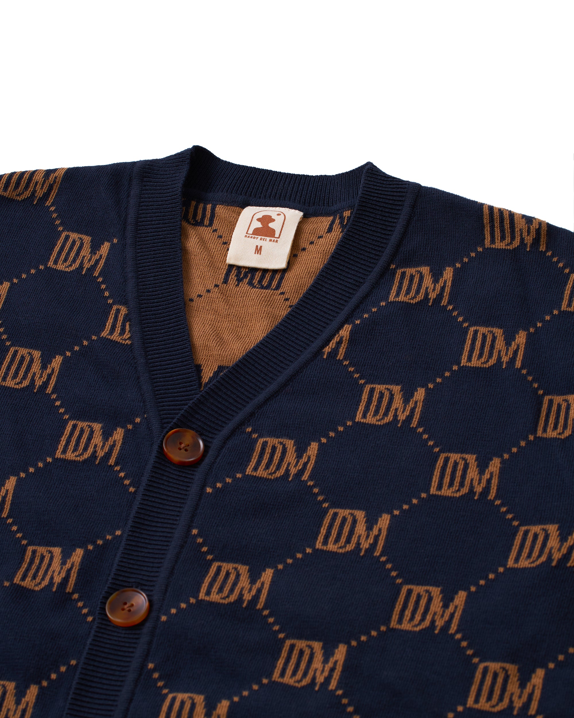 Dandy Del Mar's Castello Cardigan - Abyss with floral accents.