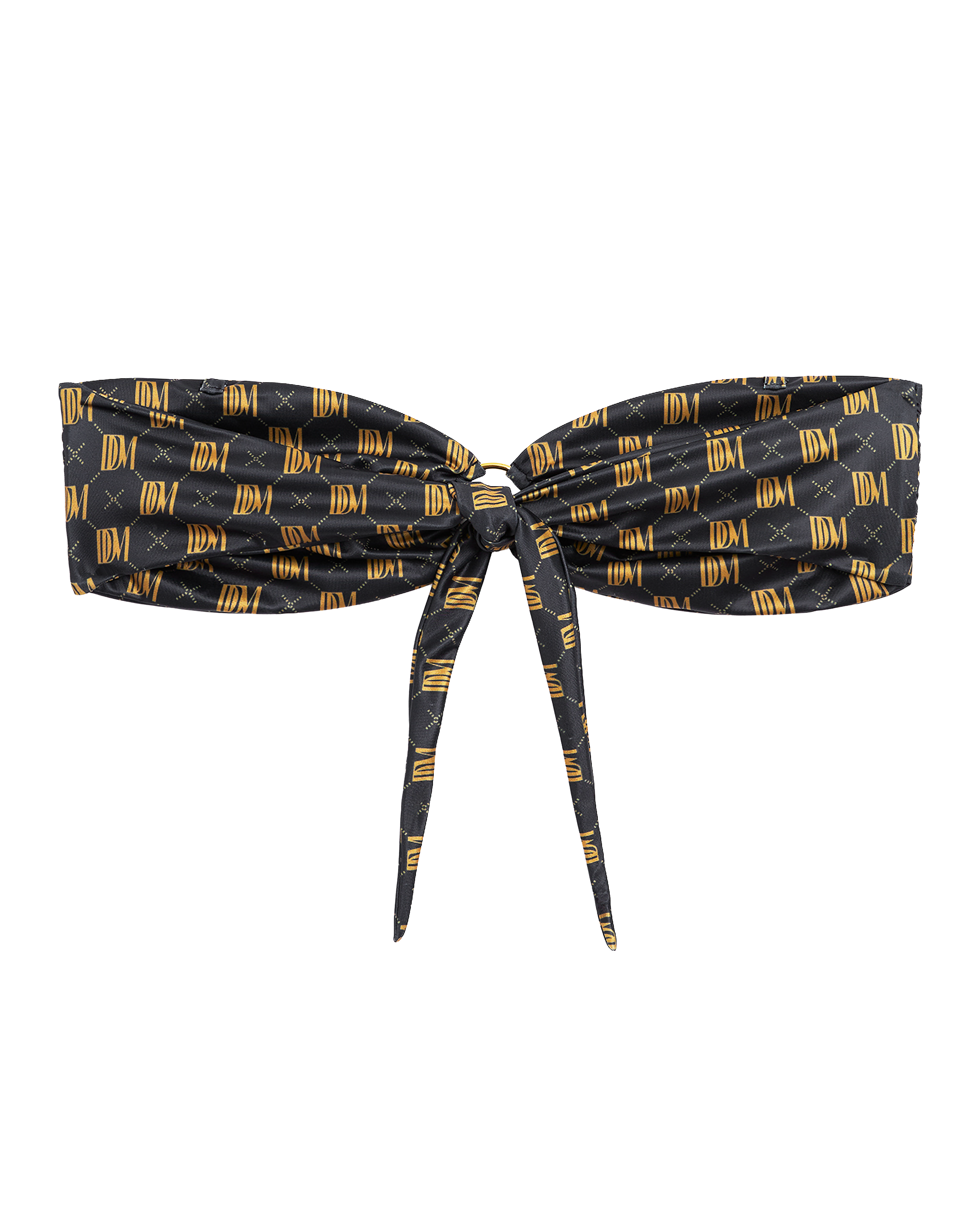 The Gomera Top - Oro Monogram by Dandy Del Mar is a black strapless bandeau bikini top featuring a front tie and gold geometric IDM logo pattern, crafted from recycled polyamide.