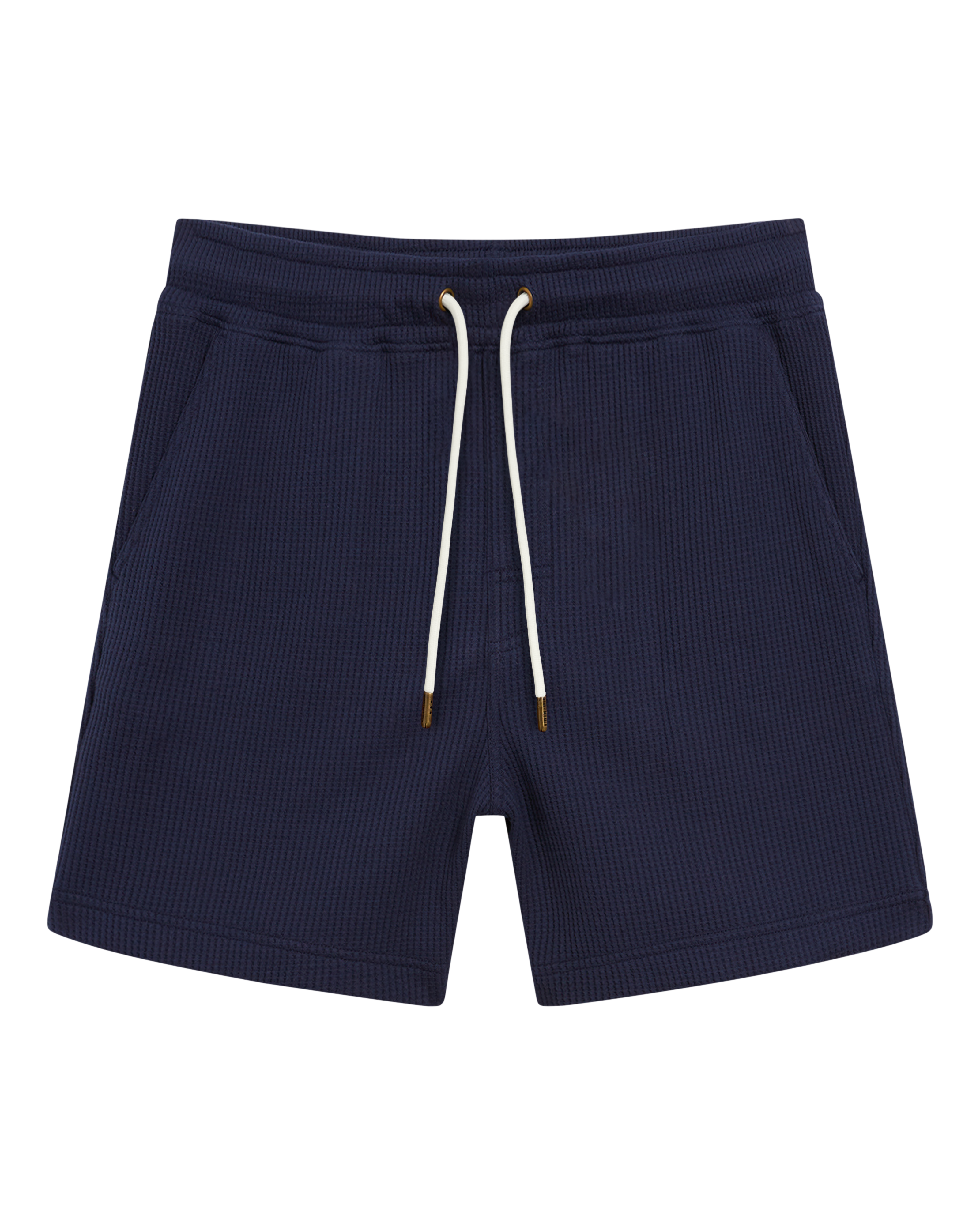 The Cannes Short - Luxe Navy by Dandy Del Mar features waffle knit fabric with a ribbed texture, two front pockets, and gold-tipped drawstrings, shown laid flat on a white background.
