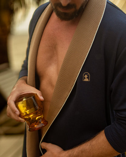 and drinking a cocktail in the Cannes Robe-Luxe Navy