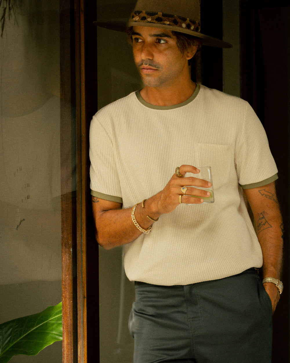 a man wearing The Cannes Waffle Knit Tee - Vintage Ivory by Dandy Del Mar.