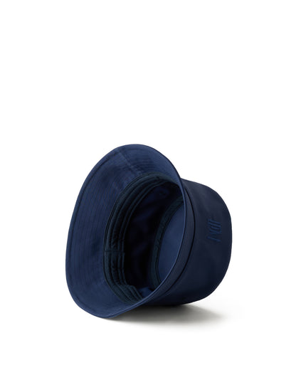 The Dandy Del Mar "The Bucket Hat - Anchor" is shown upside down, highlighting the interior stitching and sweatband, set against a white background.