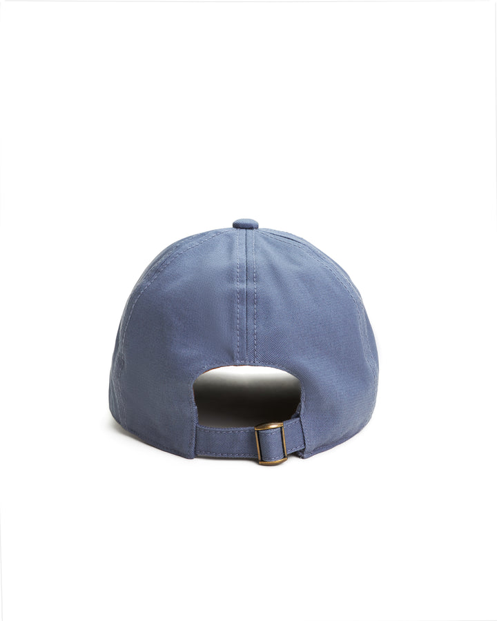 The back view of a Dandy Del Mar Dandy Icon Hat - Moontide with an antique brass adjustment.