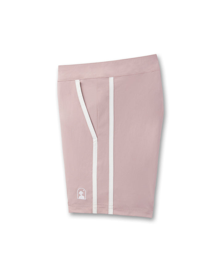 A women's Dandy Del Mar Rosado swim short with white stripes in performance fabric for 4-way stretch comfort.