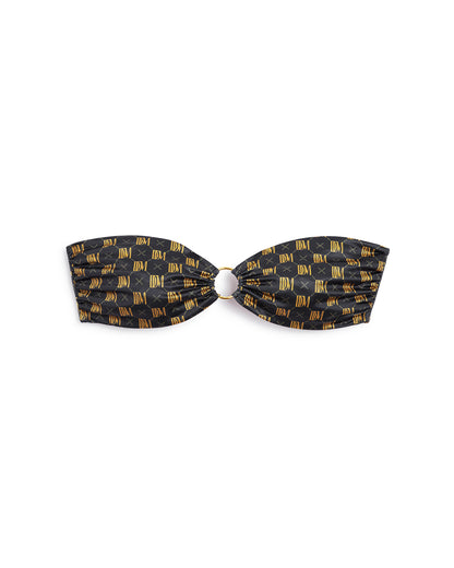 A black and gold checkered Dandy Del Mar Gomera Top - Oro Monogram bikini top.