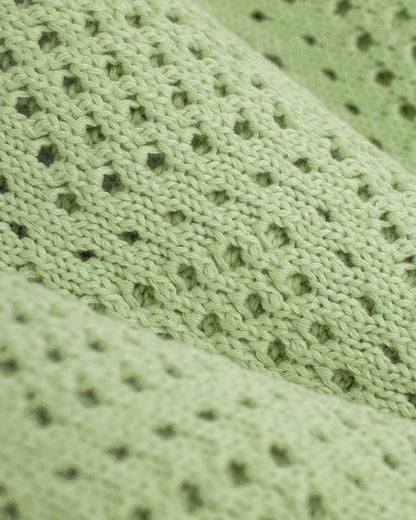 A close up of the Dandy Del Mar Antibes Crochet Shirt - Pistachio.