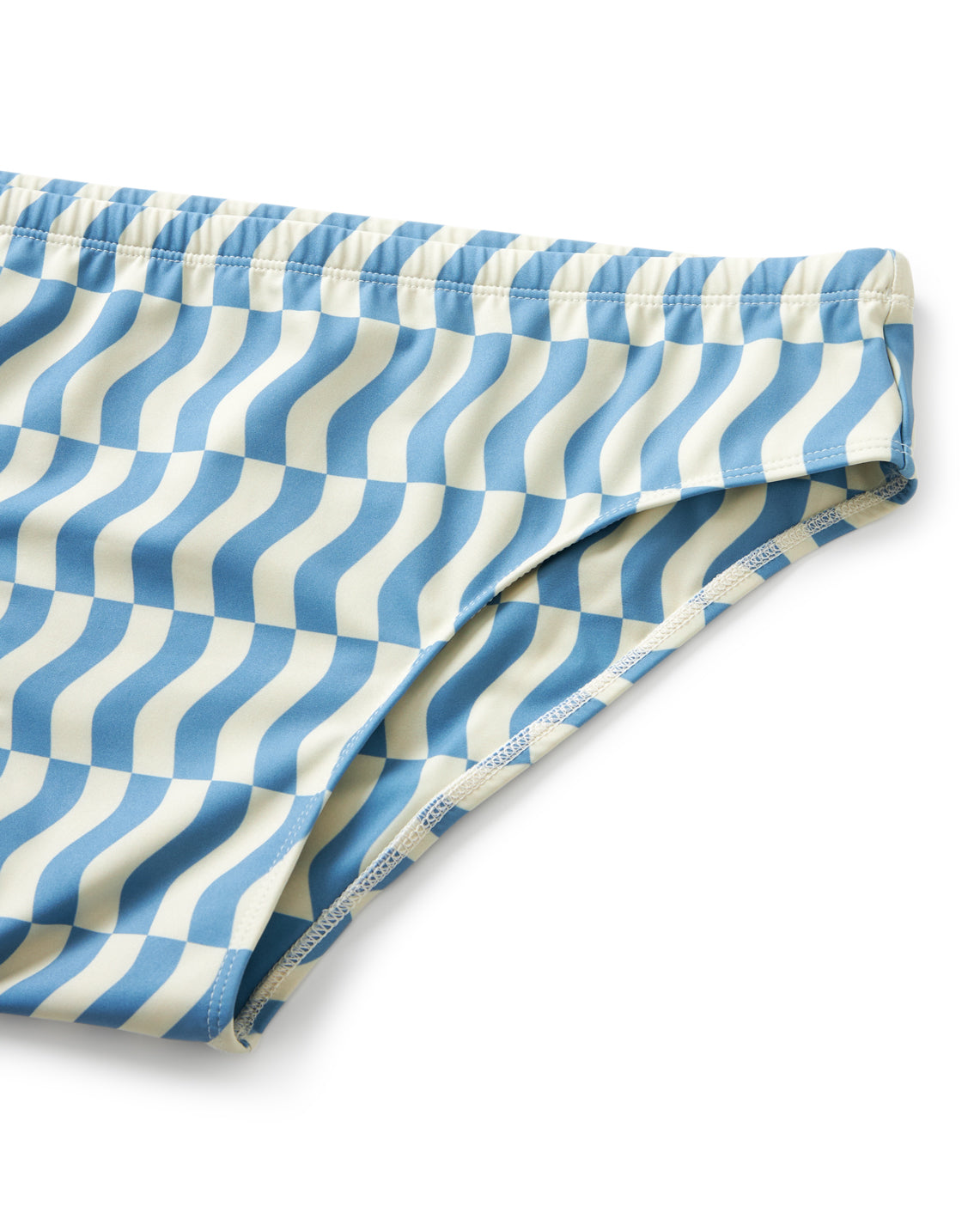 Close-up of The Belize Swim Briefs - Annapolis by Dandy Del Mar, showcasing blue and white wavy stripes, elastic waistband and leg openings, crafted from recycled polyester for the eco-conscious epicurean.