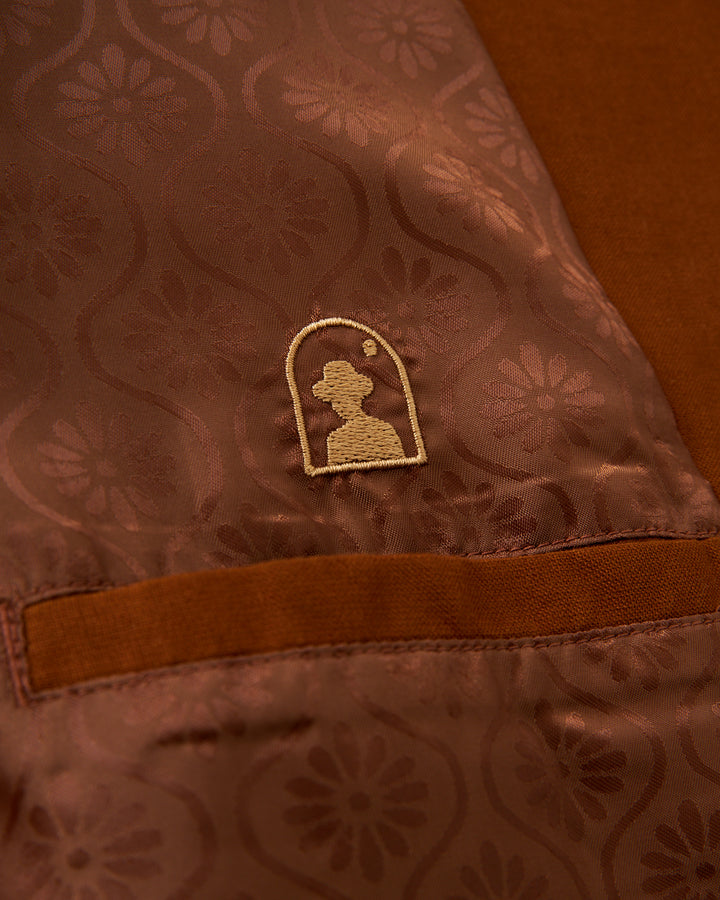 A close up of a Brisa Linen Blazer from Dandy Del Mar, perfect for formal flirtations.