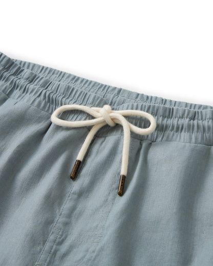 A pair of Dandy Del Mar's Brisa Linen Pant in Abalone, perfect for vacation.