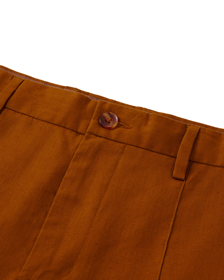 A close up image of The Brisa Linen Trouser - Sedona by Dandy Del Mar, a brown tailored fit chino pants.