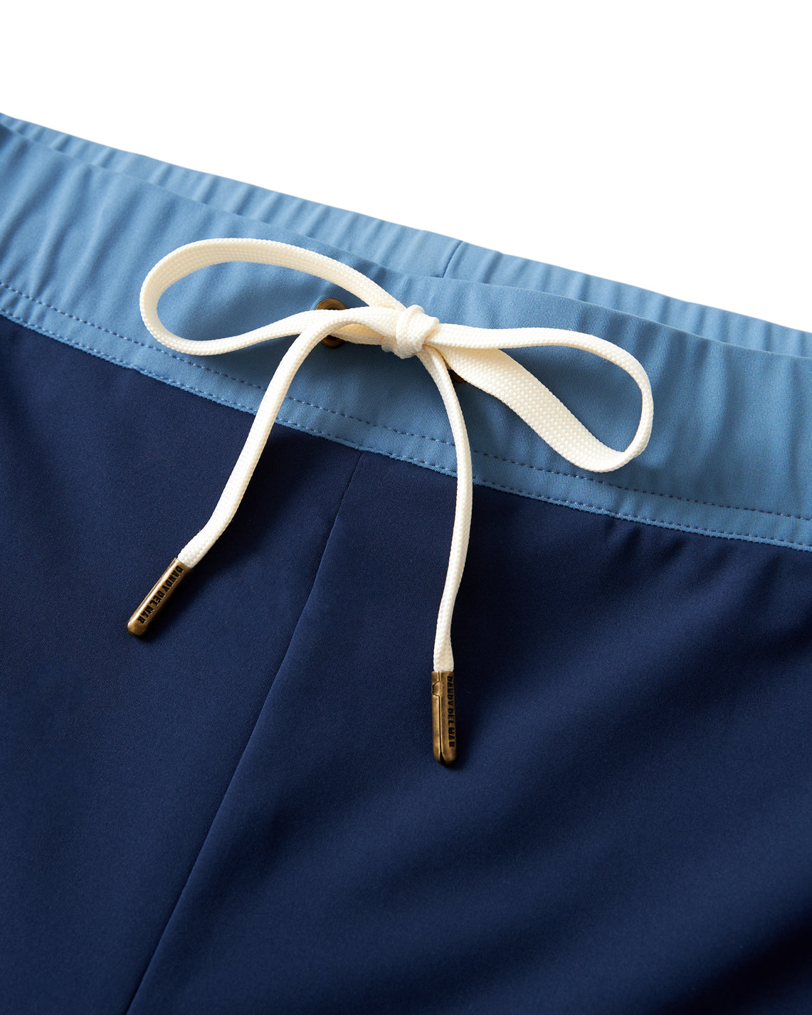 A pair of Dandy Del Mar Cassis Square Cut Swim Brief - Anchor with a gold belt, perfect for leisure and featuring a European fit.