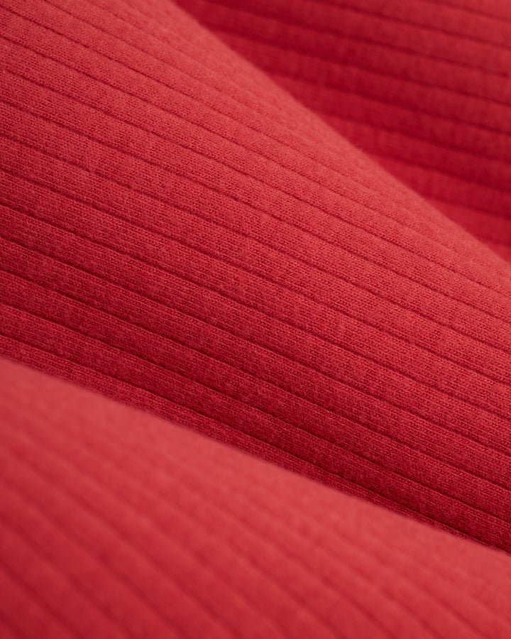 A close up image of The Milan Rib Tank in Currant by Dandy Del Mar.