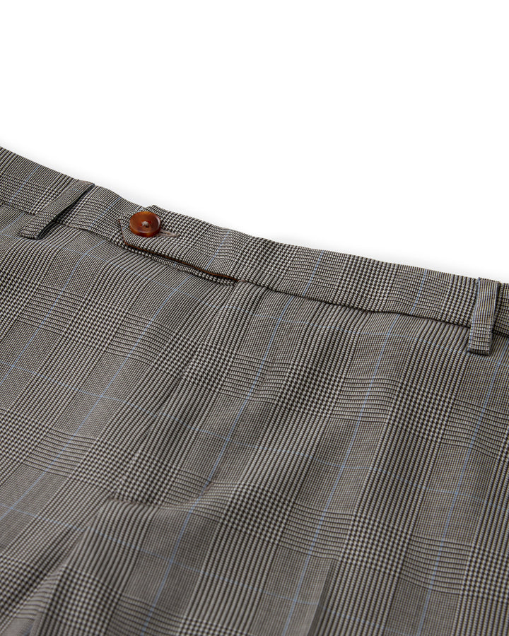 A relaxed fit Albatross Tresco Trouser, featuring a close up of a grey and blue checkered suit pant from Dandy Del Mar.