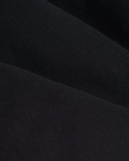 A close-up of the Dandy Del Mar Brisa Linen Trouser - Onyx.