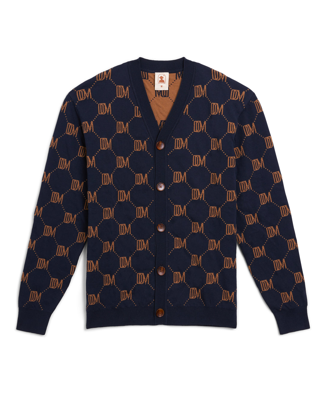 A navy and brown Castello Cardigan - Abyss by Dandy Del Mar with a monogram on it, perfect for the dandy aesthetic.