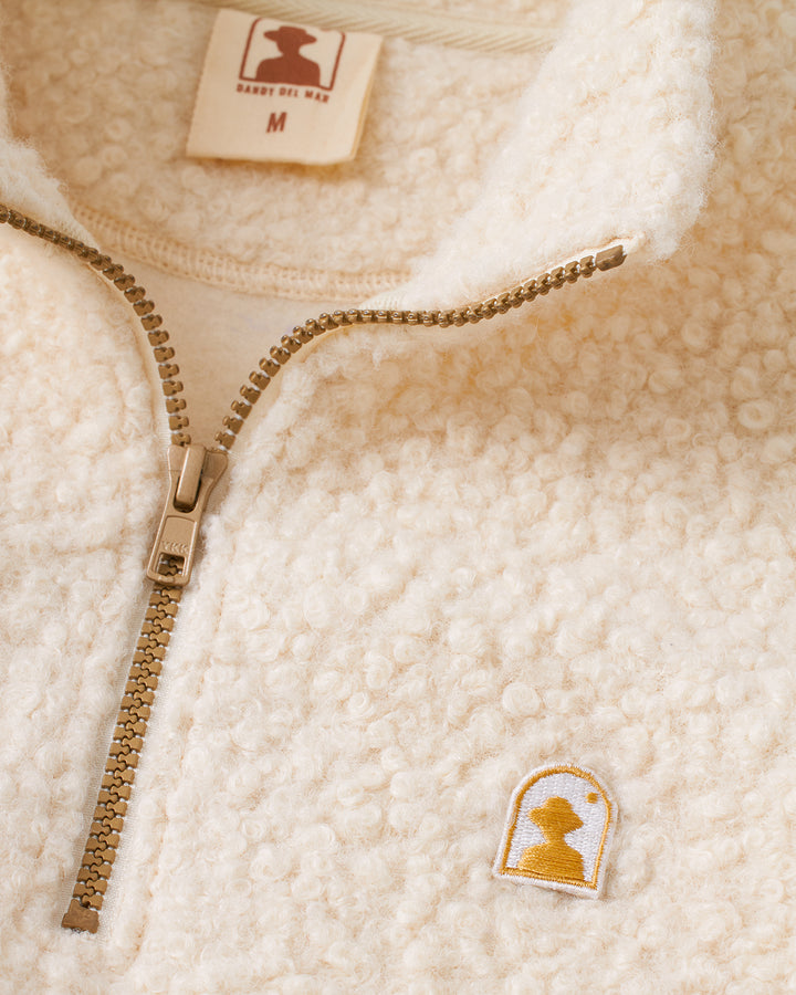 A close up of The Cusco Sherpa Pullover - Vintage Ivory by Dandy Del Mar.