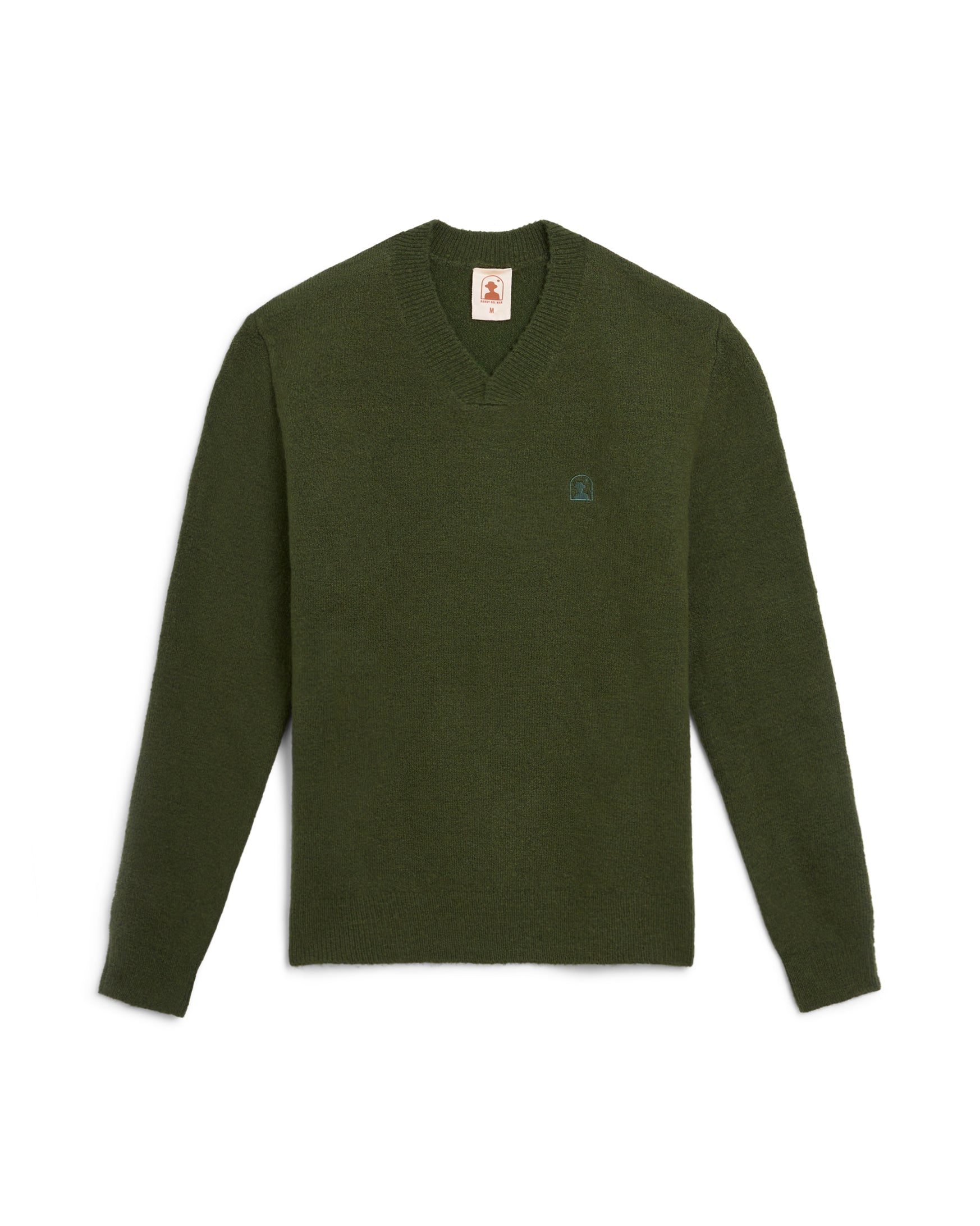 The Lima Sweater - Selva by Dandy Del Mar is a fashionable long sleeve sweater in green, featuring a unique logo, ideal for any occasion.