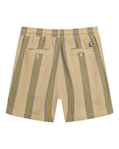 The Corralejo Shorts - Ginger by Dandy Del Mar feature beige crinkle gauze with yellow and gray stripes, two back pockets with button closures, and an elastic waist—ideal for effortless summer comfort and style.