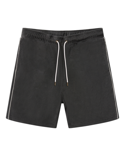 The Gaucho Terry Cloth Shorts - Onyx by Dandy Del Mar feature an elastic waistband, white drawstrings, and side pockets, showcasing classic leisurewear style against a white background.