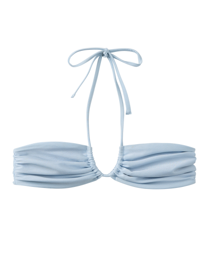 The Biarritz Top - Comet by Dandy Del Mar is a light blue, strapless bandeau bikini with ruched detailing and a thin halter tie—perfect for mixing and matching, shown on a plain background.