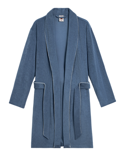 The Tropez Terry Cloth Robe - Annapolis by Dandy Del Mar is a blue, ultra-soft, above-the-knee robe with a shawl collar, white piping, long sleeves, front pockets, and a matching belt for stylish lounging.