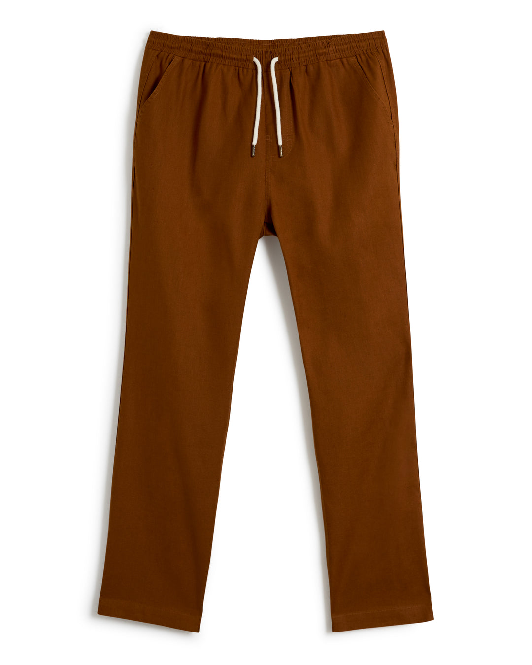 A pair of The Brisa Linen Pant - Sedona by Dandy Del Mar in brown, featuring an elastic waist and side pockets, is showcased against a white background. Perfect vacation wear.