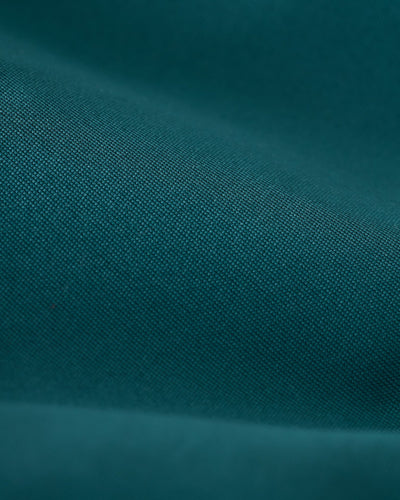 Close-up of The Mallorca Swim-Walk Shorts in Tempest Blue by Dandy Del Mar, highlighting the visible weave texture and soft folds of the single-layer nylon fabric.