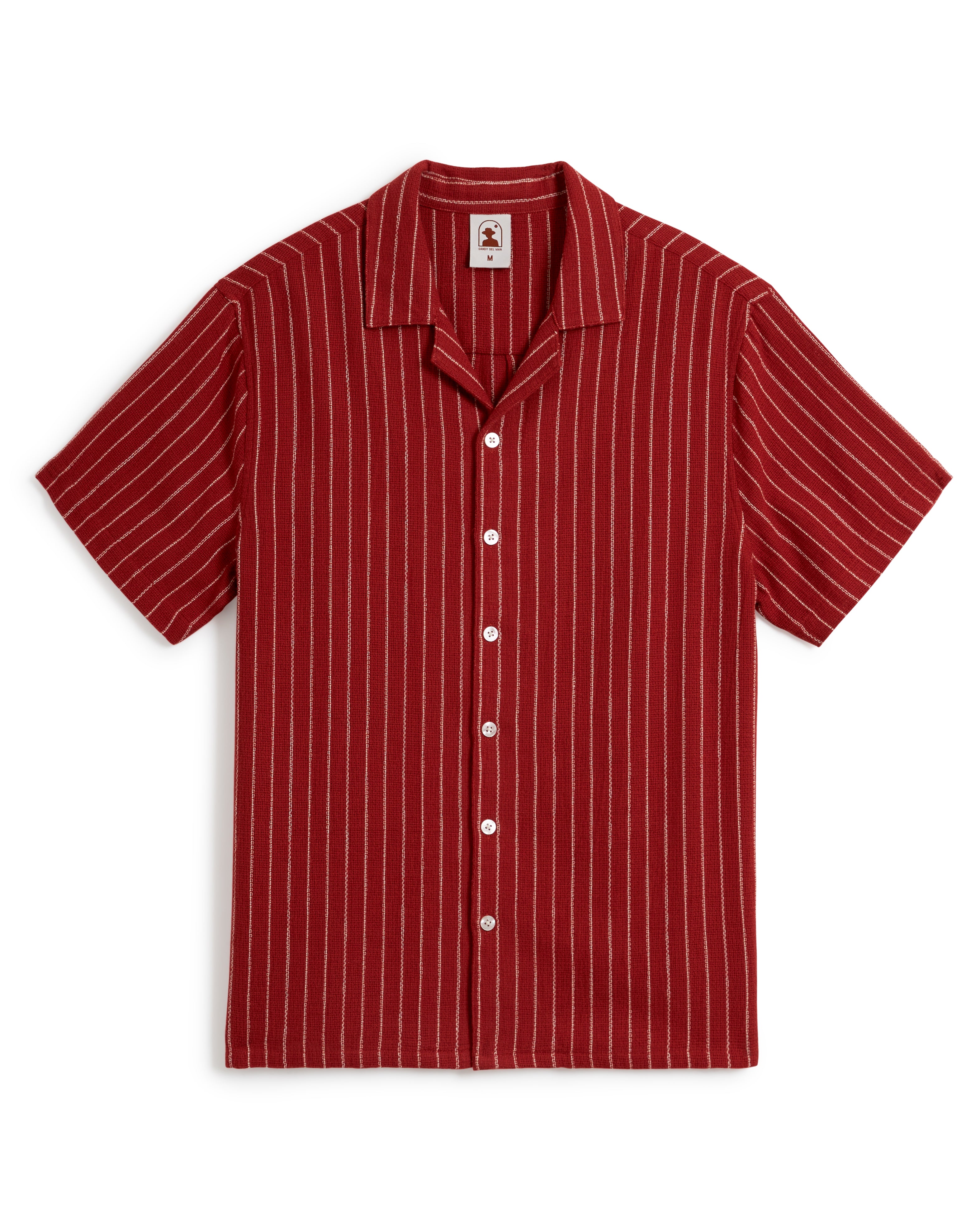 Introducing The Palma Shirt - Garam by Dandy Del Mar: a short-sleeve, button-up shirt featuring thin white vertical stripes on a red background and a stylish camp collar.