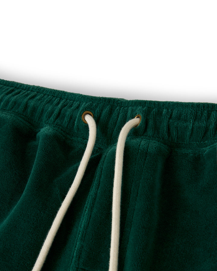 Close-up of Dandy Del Mar's The Rio Velour Short - Albero in dark green, highlighting the white drawstrings, waistband, and eyelets.