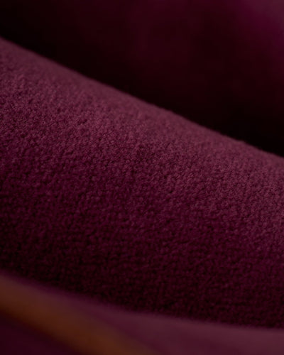 Close-up of the soft, textured Bordeaux fabric of Dandy Del Mar's The Rio Velour Shorts—ideal for men's leisurewear or athletic outings with their elastic waistband and plush finish.