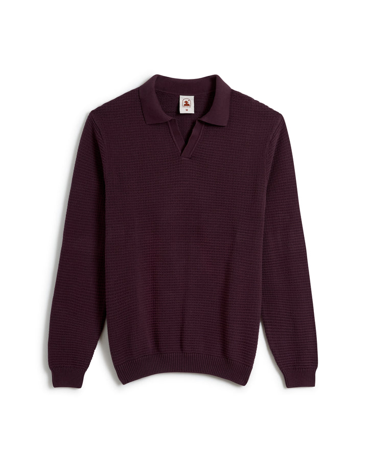 A long-sleeve, amethyst sweater-knit cotton pullover with a V-neck and collar from Dandy Del Mar's "The Sebastian Long Sleeve" collection, shown against a white background.