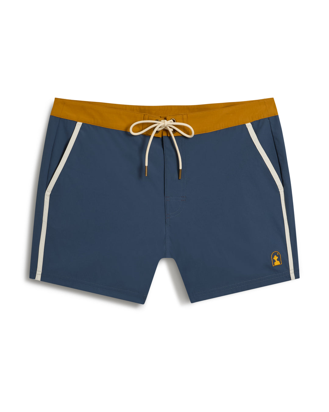 The Stirata Swim Short - Moontide by Dandy Del Mar features blue fabric with a mustard yellow waistband, white drawstring, white side piping, and a small logo on the left leg.