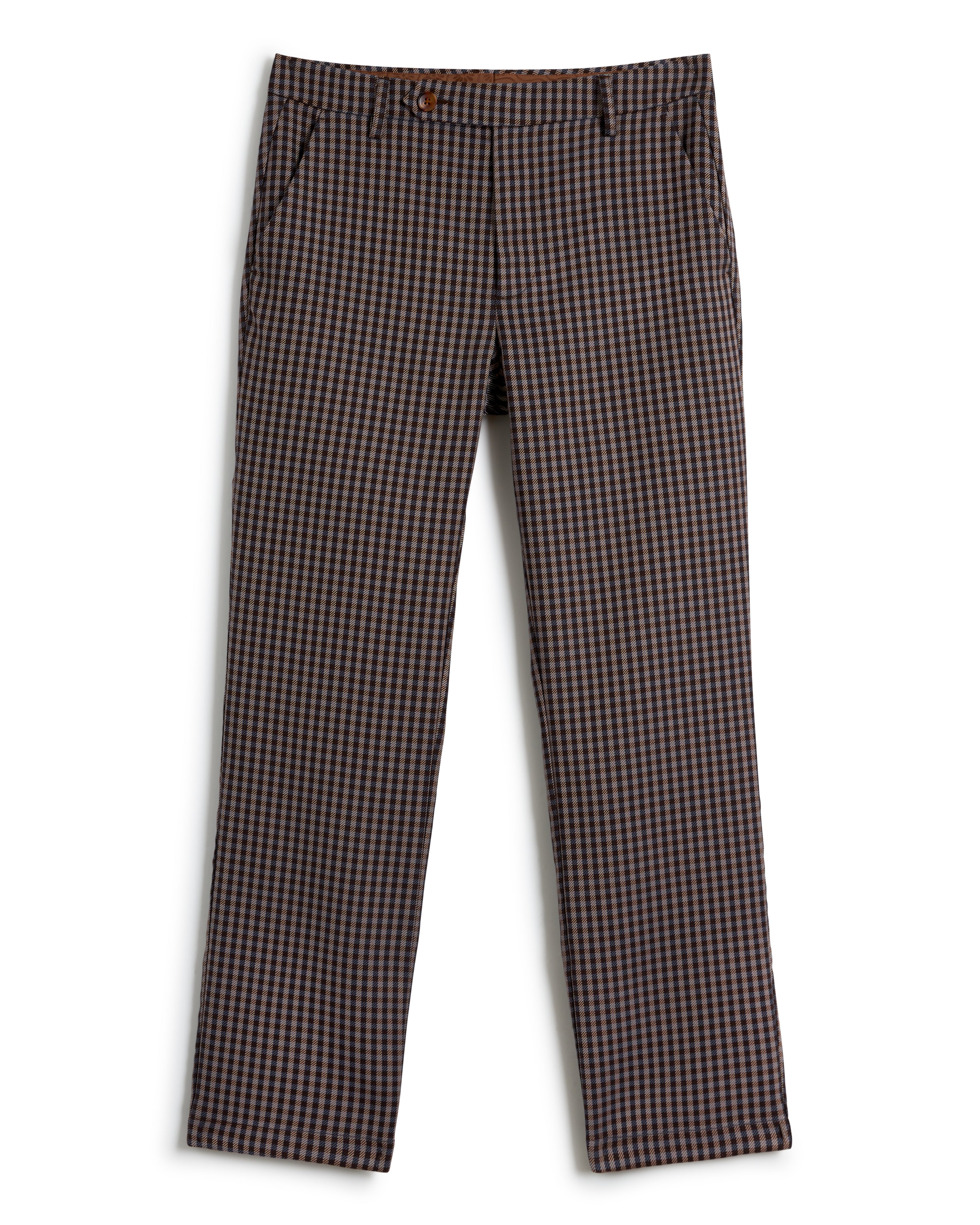 A pair of Tierra Houndstooth Tresco Trousers by Dandy Del Mar, featuring a brown and black checkered pattern with a button closure and side pockets, is displayed against a white background.