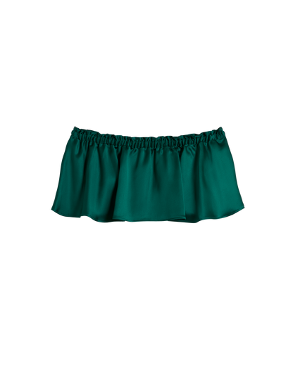 The Monaco Flounce Top - Albero by Dandy Del Mar, a dark green off-the-shoulder crop top with a flounce overlay and elastic neckline, is shown against a plain black background.
