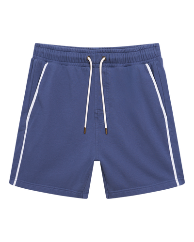 The Marseille French Terry Shorts - Moontide by Dandy Del Mar feature blue fabric, white side stripes, an elastic waistband, and white drawstrings, displayed flat on a white background.