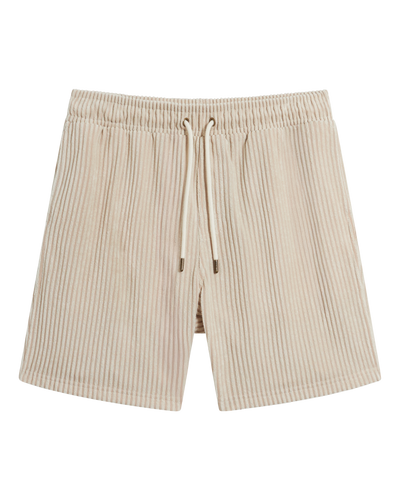 The Tropez Jacquard Shorts - Scallop Stripe by Dandy Del Mar, featuring beige and white vertical stripes, an elastic waistband, and adjustable drawstring, are shown laid flat on a white background.