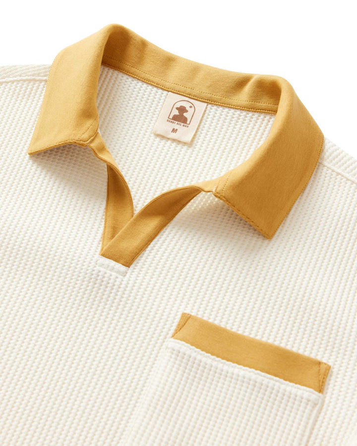 white shirt with cream collar of dandy del mar