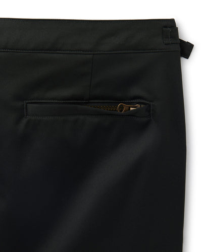 Close-up of Dandy Del Mar’s Mallorca Swim-Walk Shorts in Onyx, featuring a zippered pocket, partial waistband with belt loop, and adjustable side fasteners.