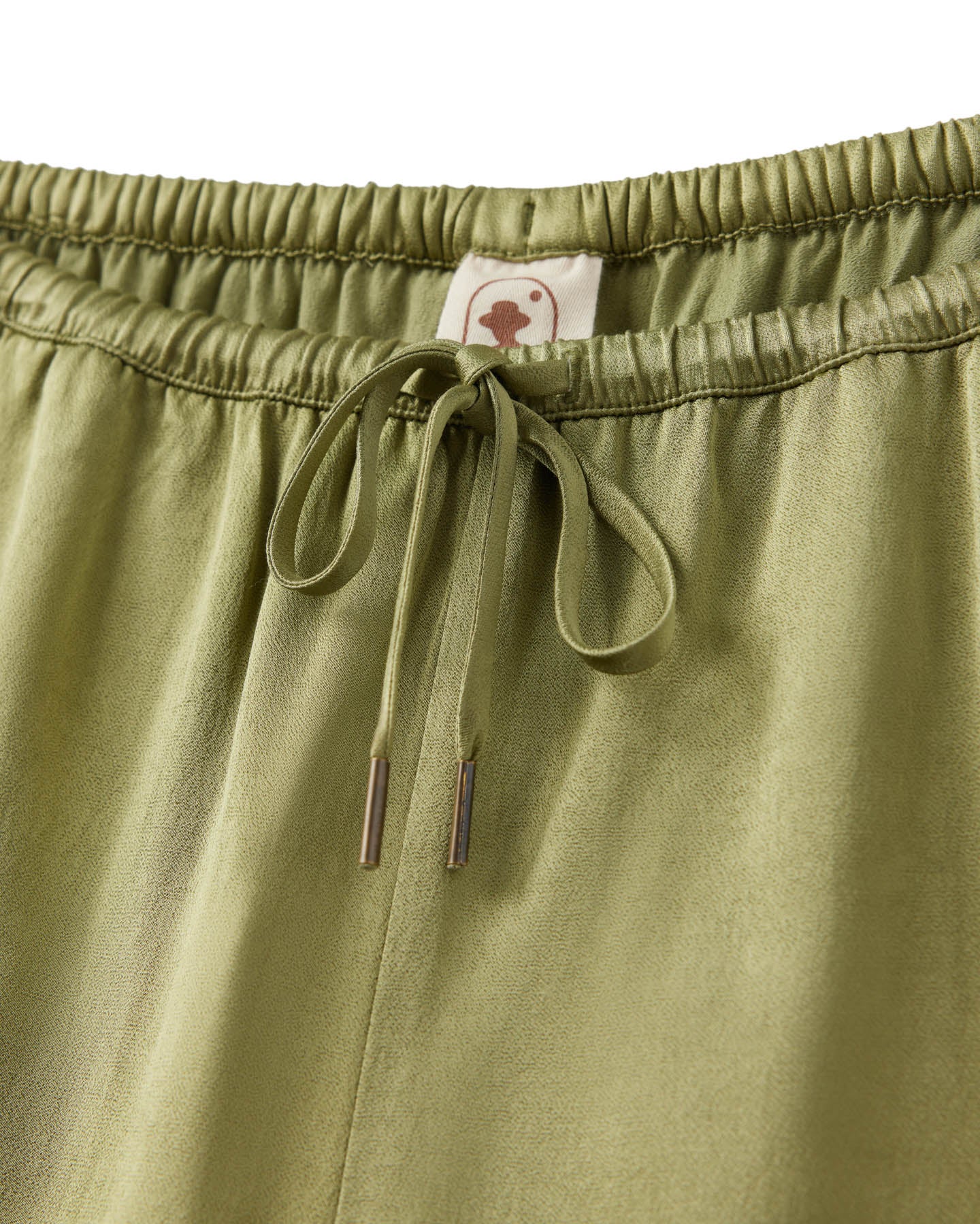 woman silk green short