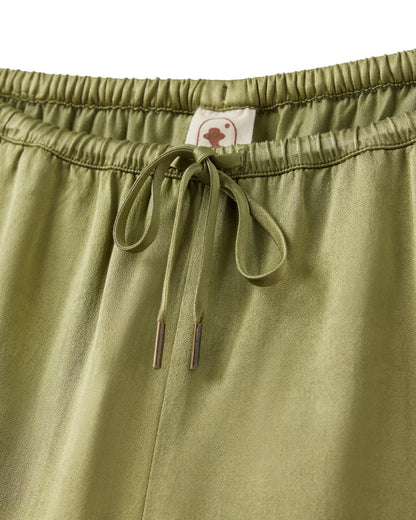 woman silk green short